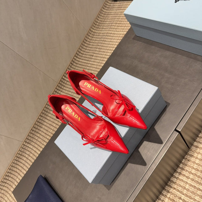 PRADA 26S POINTED TOE CUT OUT HIGH HEELS 75MM IN BRIGHT RED CALFSKIN WITH BOW