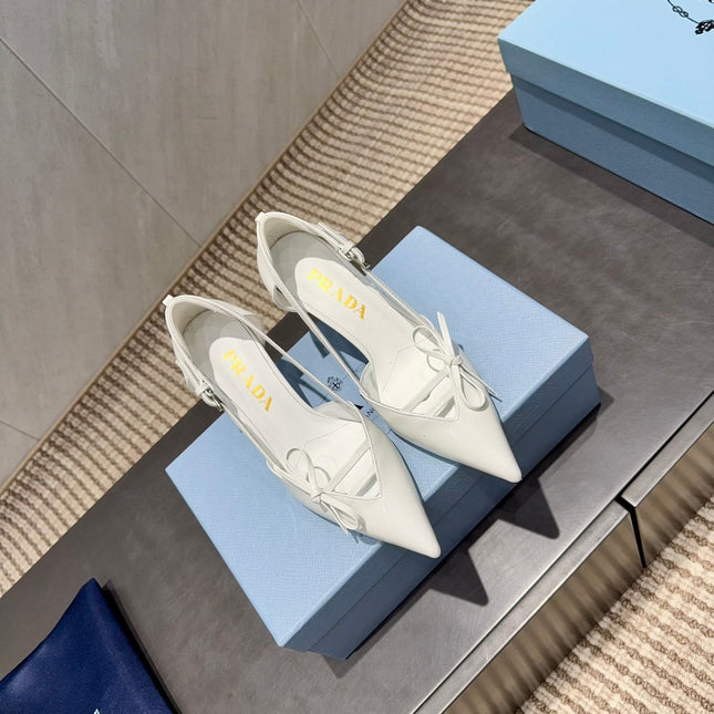 PRADA 26S POINTED TOE CUT OUT HIGH HEELS 75MM IN WHITE CALFSKIN WITH BOW