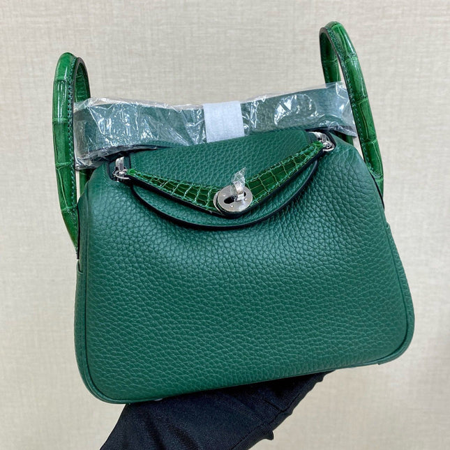 HM 25S MINI LINDY 19 CM IN DARK GREEN COWHIDE WITH CROCODILE HANDLE AND SILVER HARDWARE