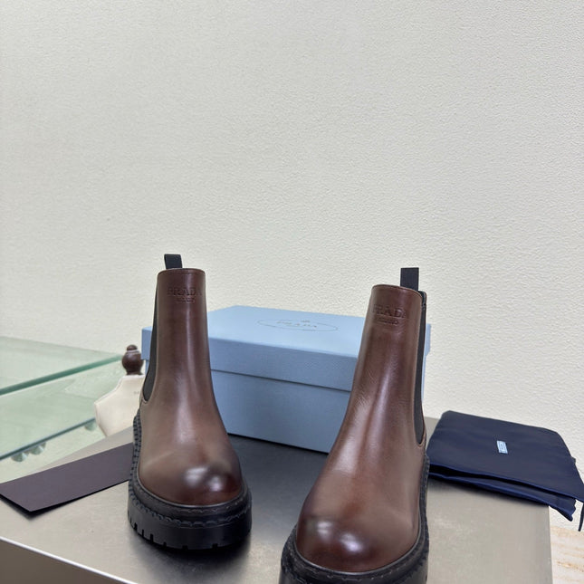 PRADA 25S PLATFORM CHELSEA BOOTS IN DARK BROWN CALFSKIN