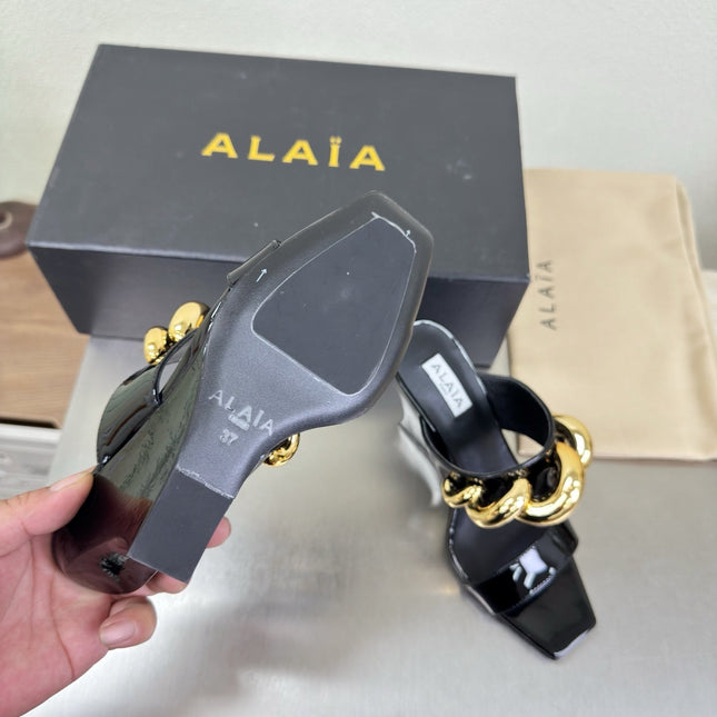 ALAIA 26S DOUBLE STRAP WEDGE SANDALS 110 MM IN BLACK GLOSSY CALFSKIN WITH GOLD HARDWARE