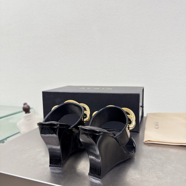 ALAIA 26S DOUBLE STRAP WEDGE SANDALS 110 MM IN BLACK GLOSSY CALFSKIN WITH GOLD HARDWARE