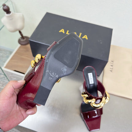 ALAIA 26S DOUBLE STRAP WEDGE SANDALS 110 MM IN DARK RED GLOSSY CALFSKIN WITH GOLD HARDWARE