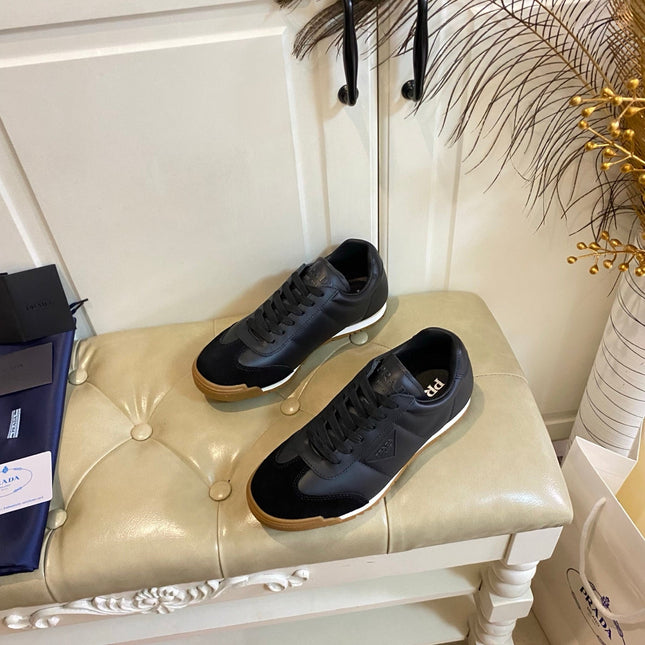 PRADA 26S LACE UP SNEAKERS IN BLACK CALFSKIN AND SUEDE
