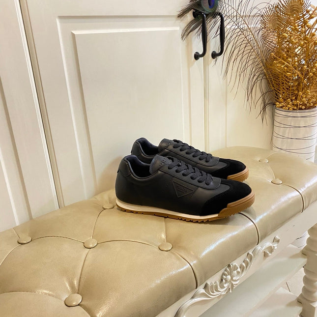 PRADA 26S LACE UP SNEAKERS IN BLACK CALFSKIN AND SUEDE