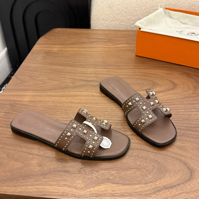 HM 26S ORAN STUDDED SANDALS IN DARK BROWN CALFSKIN