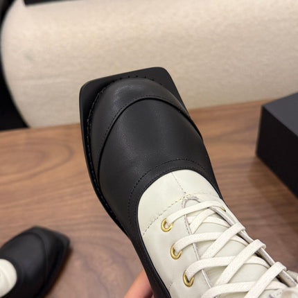 CHANEL 26S LACE UP HIGH TOP BOOTS 45 MM IN BLACK AND WHITE CALFSKIN