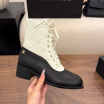 CHANEL 26S LACE UP HIGH TOP BOOTS 45 MM IN BLACK AND WHITE CALFSKIN