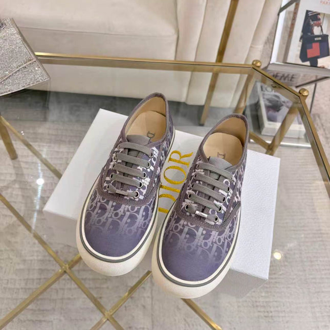 DIOR 26S LOW-TOP SNEAKERS IN LIGHT PURPLE DIOR OBLIQUE CANVAS