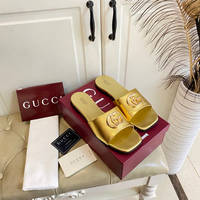GUCCI 26S SLIDES IN GOLD CALFSKIN