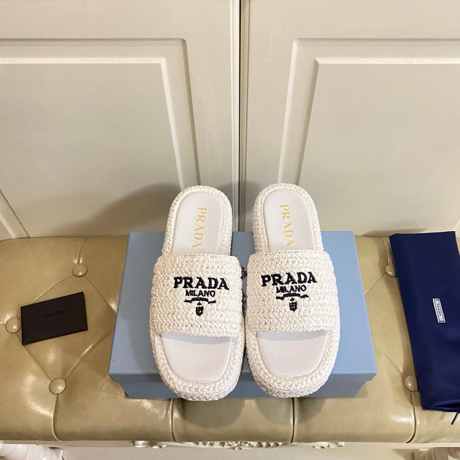 PRADA 26S SLIDE SANDALS IN WHITE LOGO RAFFIA