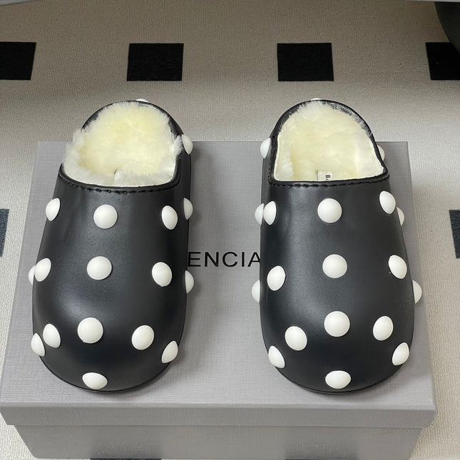 BALENCIAGA 25S FUR-LINED MULES IN BLACK AND WHITE FAUX LEATHER