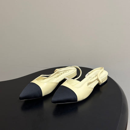 CHANEL 26S POINTED TOE SLINGBACKS IN CREAM LAMBSKIN AND BLACK FABRIC