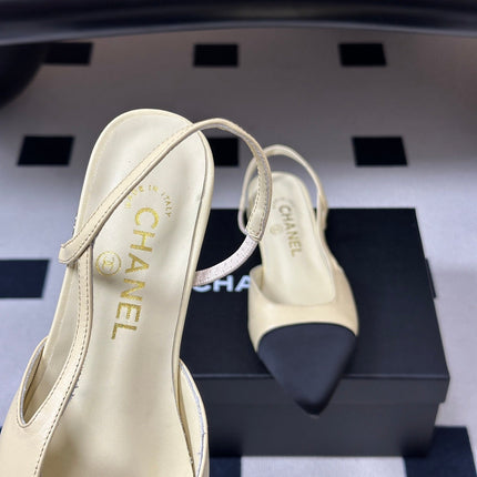 CHANEL 26S POINTED TOE SLINGBACKS IN CREAM LAMBSKIN AND BLACK FABRIC