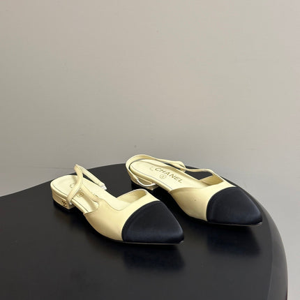 CHANEL 26S POINTED TOE SLINGBACKS IN CREAM LAMBSKIN AND BLACK FABRIC