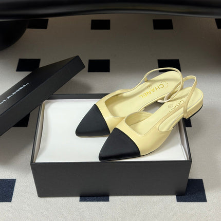 CHANEL 26S POINTED TOE SLINGBACKS IN CREAM LAMBSKIN AND BLACK FABRIC