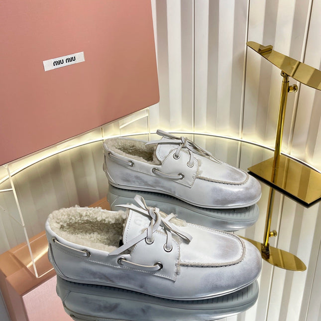 MIUMIU 26S FUR BOAT SHOES IN LIGHT GRAY CALFSKIN