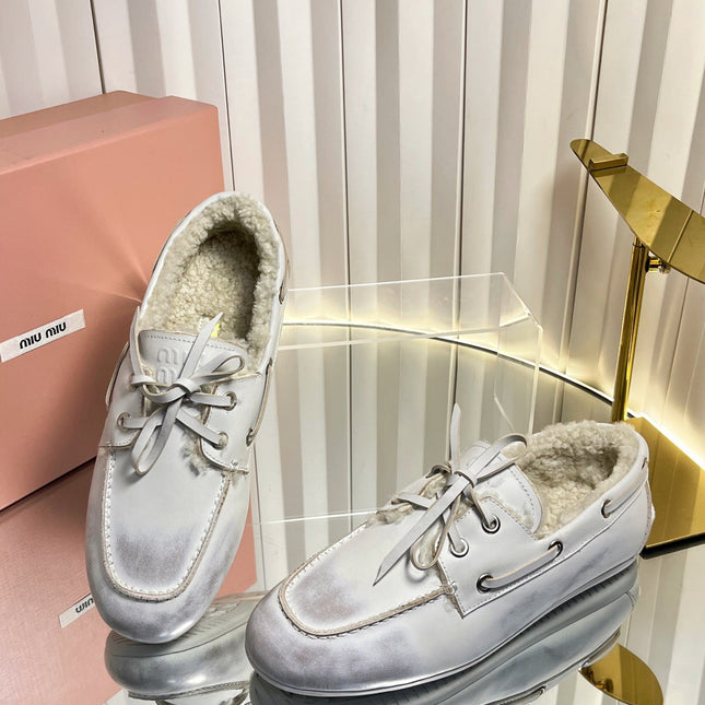MIUMIU 26S FUR BOAT SHOES IN LIGHT GRAY CALFSKIN