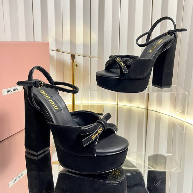 MIUMIU 26S PLATFORM ANKLE STRAP SANDALS 120MM IN BLACK SUEDE WITH BOW