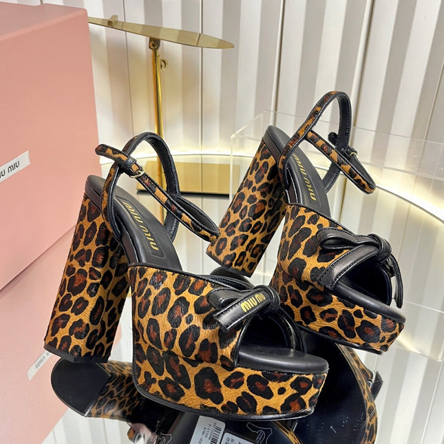 MIUMIU 26S PLATFORM ANKLE STRAP SANDALS 120MM IN LEOPARD PRINT CALF HAIR WITH BOW