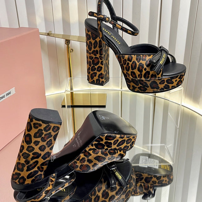 MIUMIU 26S PLATFORM ANKLE STRAP SANDALS 120MM IN LEOPARD PRINT CALF HAIR WITH BOW