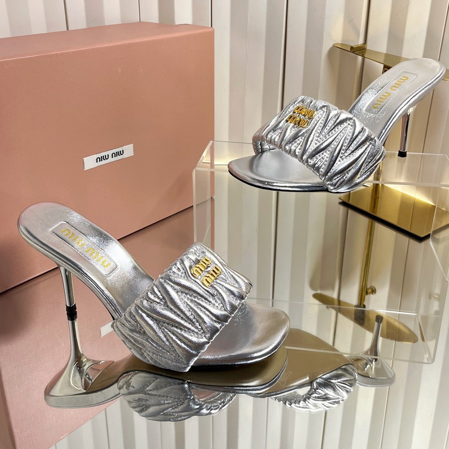 MIUMIU 26S HIGH-HEEL MULE SANDALS 85MM IN SILVER CALFSKIN GOLD HARDWARE