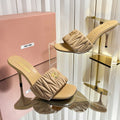 MIUMIU 26S HIGH-HEEL MULE SANDALS 85MM IN BEIGE CALFSKIN GOLD HARDWARE