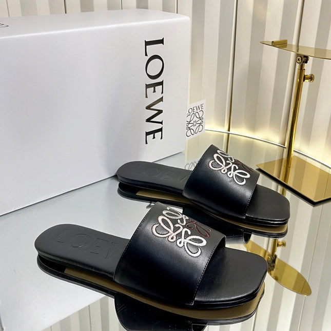 LOEWE 26S LOGO-EMBROIDERED SANDALS IN BLACK CALFSKIN