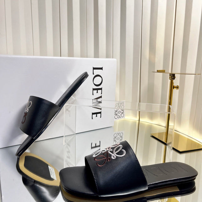 LOEWE 26S LOGO-EMBROIDERED SANDALS IN BLACK CALFSKIN