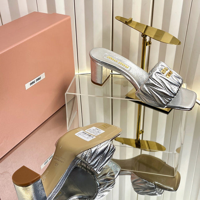 MIUMIU 26S PADDED MATELASSE MULE HEELS 65MM IN SILVER CALFSKIN GOLD HARDWARE
