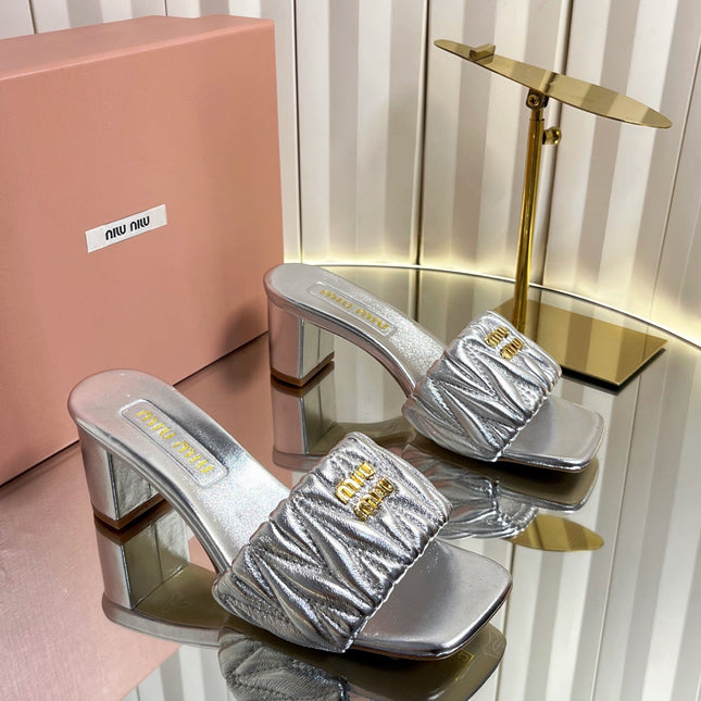 MIUMIU 26S PADDED MATELASSE MULE HEELS 65MM IN SILVER CALFSKIN GOLD HARDWARE