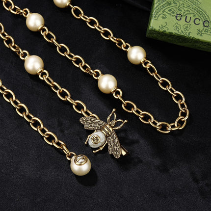 GUCCI 26S BEE PEARL CHAIN NECKLACE IN GOLD TONE METAL 615893