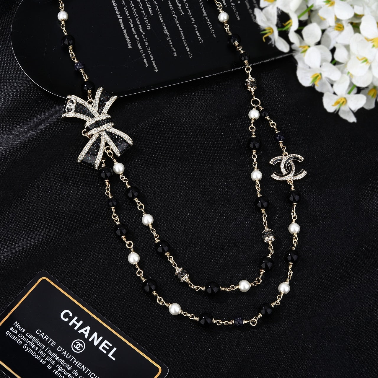 CHANEL 25S CHAIN BELT IN BLACK AND WHITE PEARL 614285