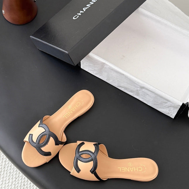 CHANEL MULES IN BEIGE MIX BLACK CALFSKIN