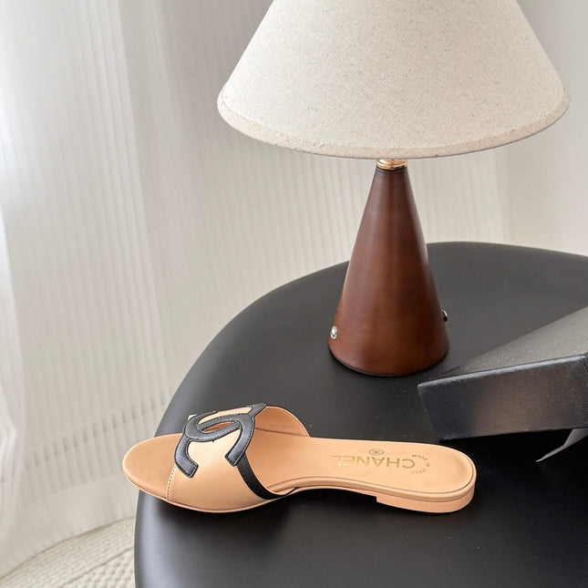 CHANEL MULES IN BEIGE MIX BLACK CALFSKIN