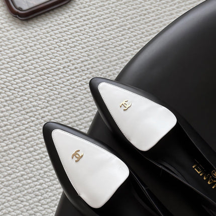 CHANEL 26S SLINGBACK FLAT IN BLACK AND WHITE CALFSKIN WITH CC LOGO