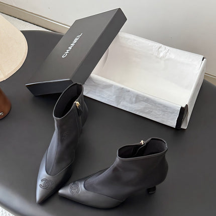 CHANEL 26S ANKLE BOOTS IN BLACK LAMBKIN