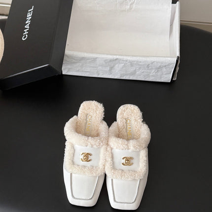 CHANEL 26S MULES IN WHITE SHEARLING AND CALFSKIN