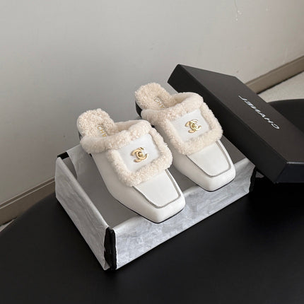 CHANEL 26S MULES IN WHITE SHEARLING AND CALFSKIN