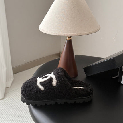 CHANEL 26S SLIDE SANDALS IN BLACK SHEARLING UPPER AND LINING WITH WHITE CC LOGO
