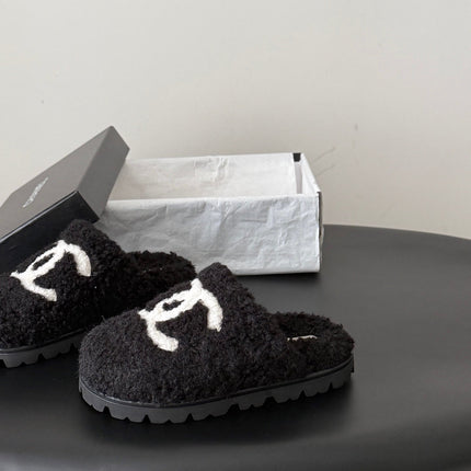 CHANEL 26S SLIDE SANDALS IN BLACK SHEARLING UPPER AND LINING WITH WHITE CC LOGO