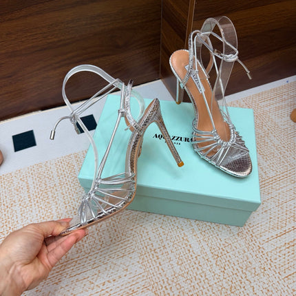 AQUAZZURA 26S LACE-UP HEEL SANDALS 100 MM IN SILVER CALFSKIN