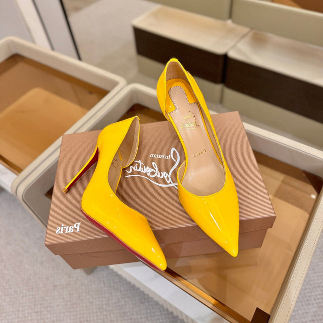 CHRISTIAN LOUBOUTIN 26S CUTOUT SIDE PUMP HEELS 105 MM IN YELLOW PATENT CALFSKIN