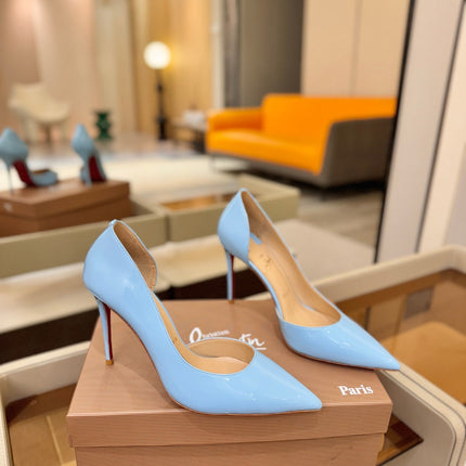 CHRISTIAN LOUBOUTIN 26S CUTOUT SIDE PUMP HEELS 105 MM IN LIGHT BLUE PATENT CALFSKIN