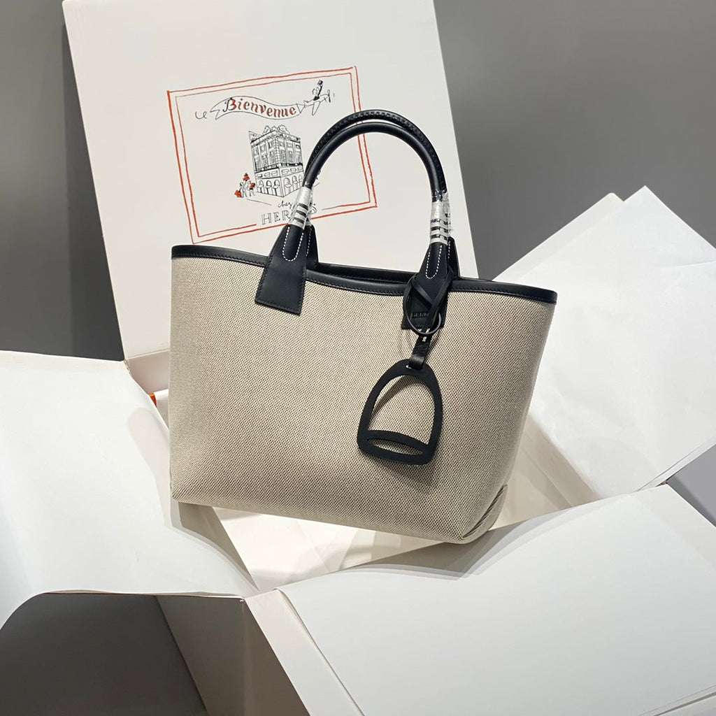 STEEPLE 28 BAG IN OFF-WHITE H CANVAS AND BLACK SWIFT CALFSKIN