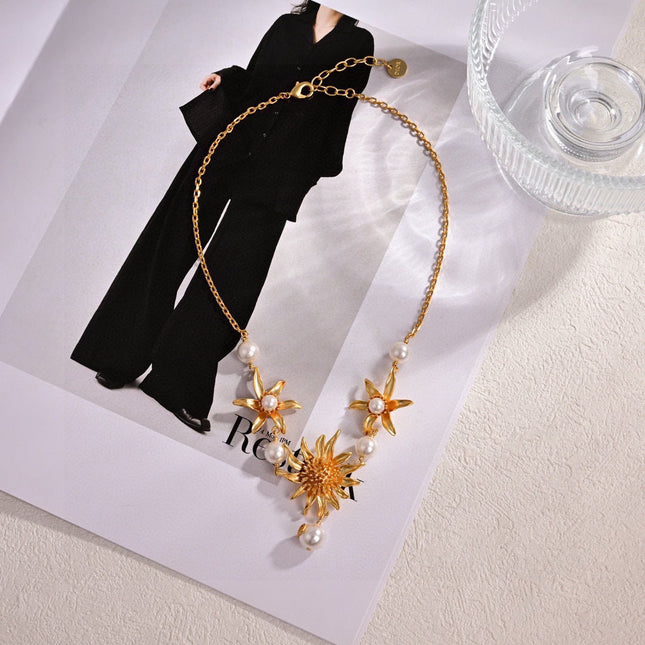 CD 26S PEARL FLORAL SUNBURST STATEMENT NECKLACE IN GOLD TONE METAL 629849