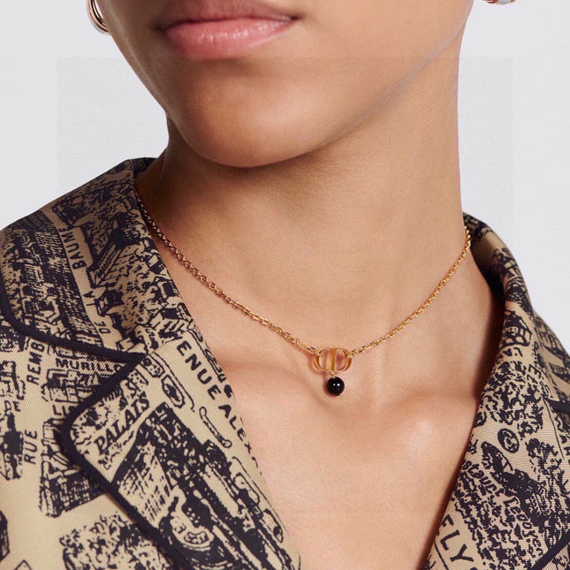 CD 26S CD LOGO BLACK BEAD DROP NECKLACE IN GOLD TONE METAL 631856