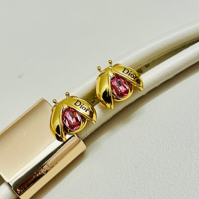 CD 26S LADYBUG PINK CRYSTAL STUD EARRINGS IN GOLD TONE METAL 644370