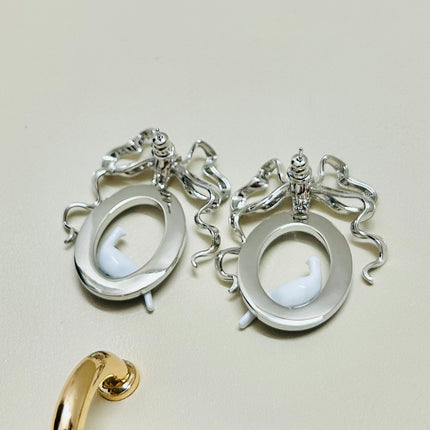 CD 26S TOILE DE JOUY BIRD BOW DROP EARRINGS IN SILVER TONE METAL 644371