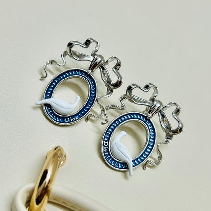 CD 26S TOILE DE JOUY BIRD BOW DROP EARRINGS IN SILVER TONE METAL 644371